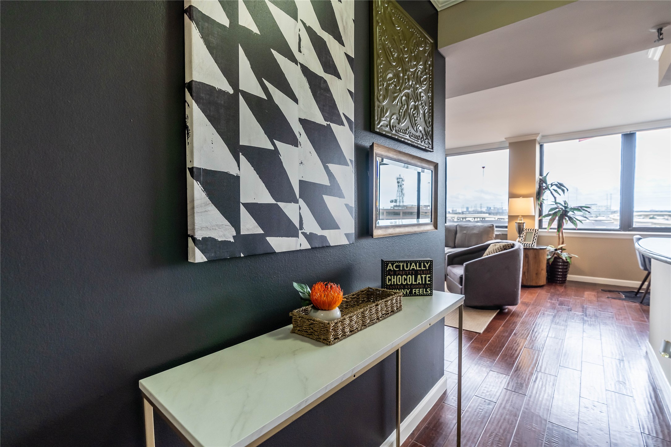 3525 Sage Road, Unit 1009 Houston, TX 77056 - Photo 17 of 23 a living room with furniture and a wooden floor