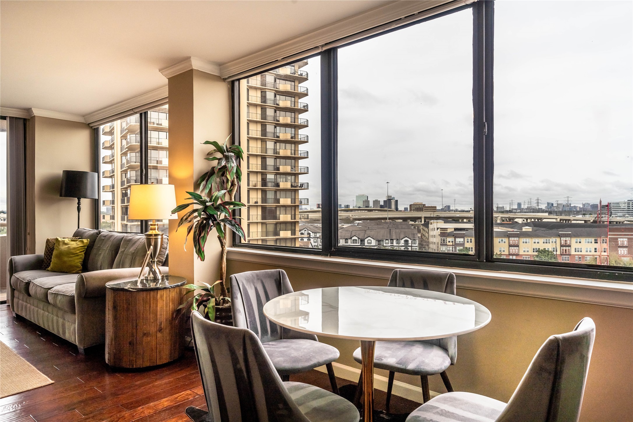 3525 Sage Road, Unit 1009 Houston, TX 77056 - Photo 5 of 23 a living room with furniture and a large window