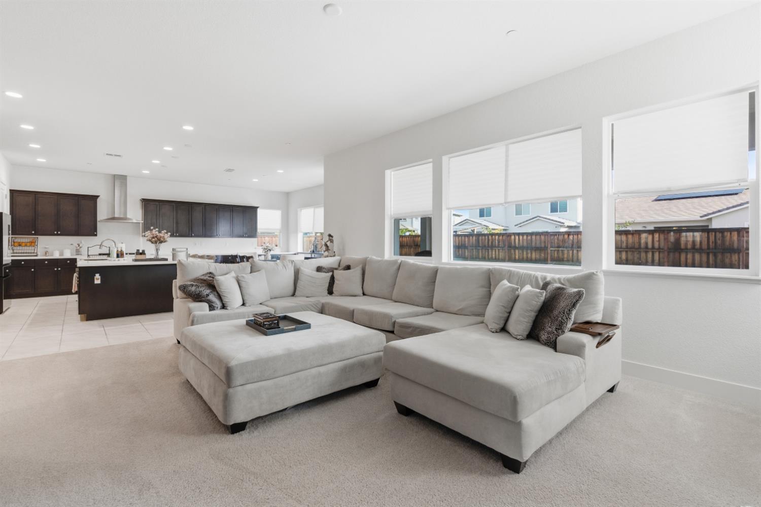 3233 Kipling Drive Lathrop, CA 95330 - Photo 14 of 39 a living room with furniture and a large window