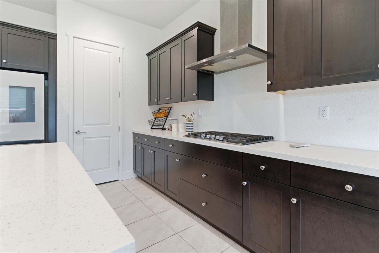 3233 Kipling Drive Lathrop, CA 95330 - Photo 17 of 39 a kitchen with a sink and cabinets