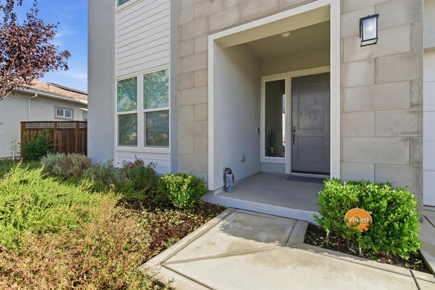 3233 Kipling Drive Lathrop, CA 95330 - Photo 2 of 39 a view of a garden with potted plants