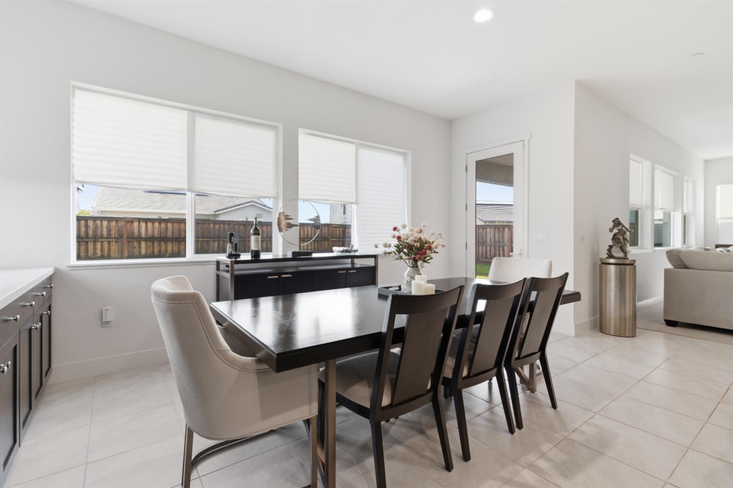 3233 Kipling Drive Lathrop, CA 95330 - Photo 19 of 39 a dining room with furniture and window
