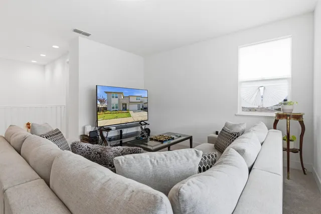 a view of a hallway view with staircase