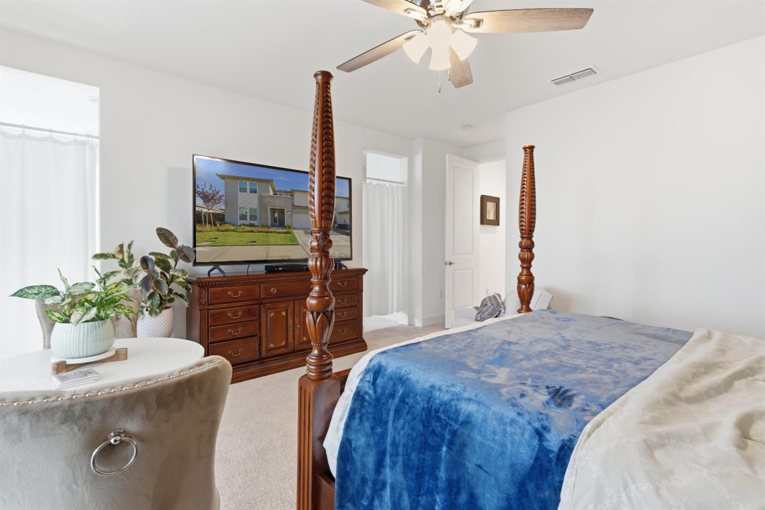 3233 Kipling Drive Lathrop, CA 95330 - Photo 32 of 39 a bedroom with a bed and a flat screen tv