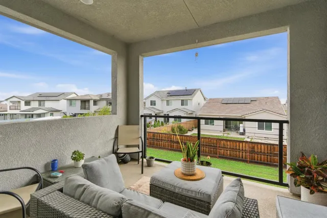 a bathroom with a double vanity sink mirror and shower