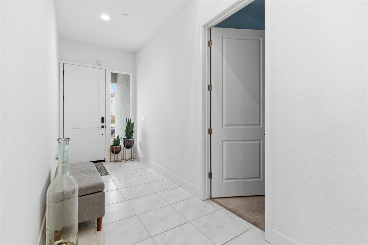 3233 Kipling Drive Lathrop, CA 95330 - Photo 4 of 39 a room with furniture and a potted plant