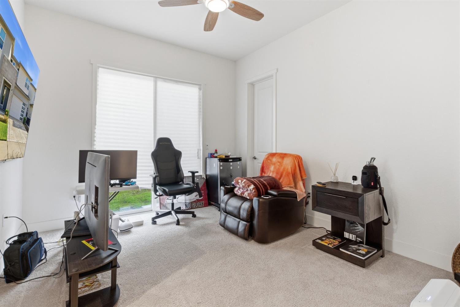 3233 Kipling Drive Lathrop, CA 95330 - Photo 5 of 39 a view of a workspace with furniture and a window