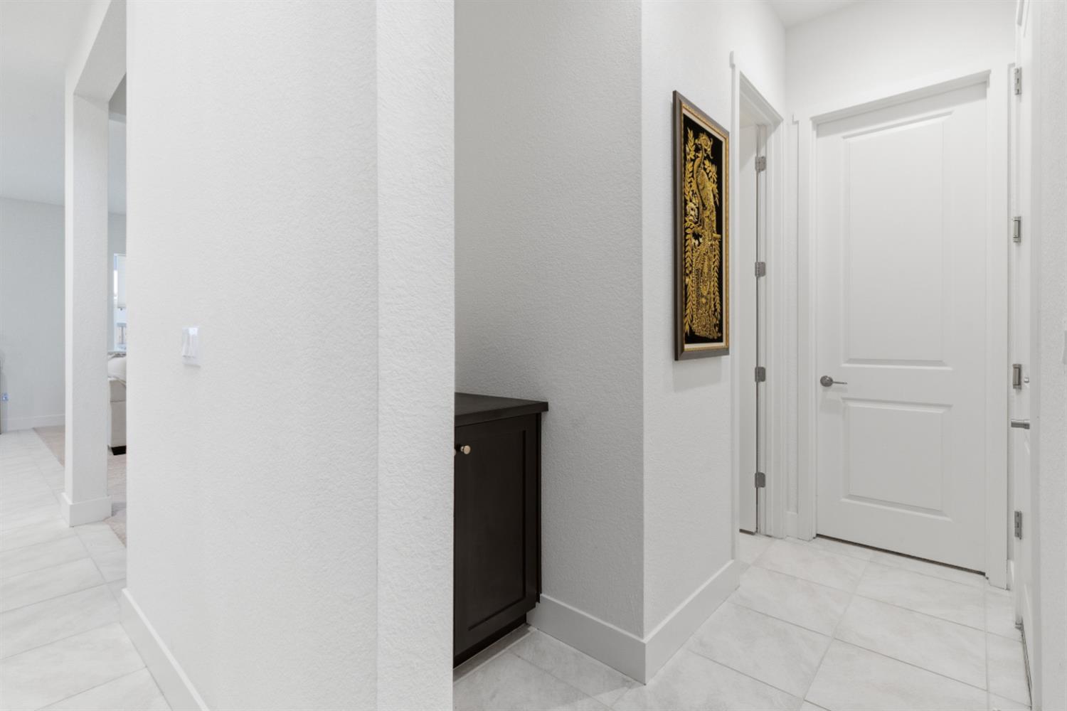 3233 Kipling Drive Lathrop, CA 95330 - Photo 7 of 39 an empty room with windows and cabinet