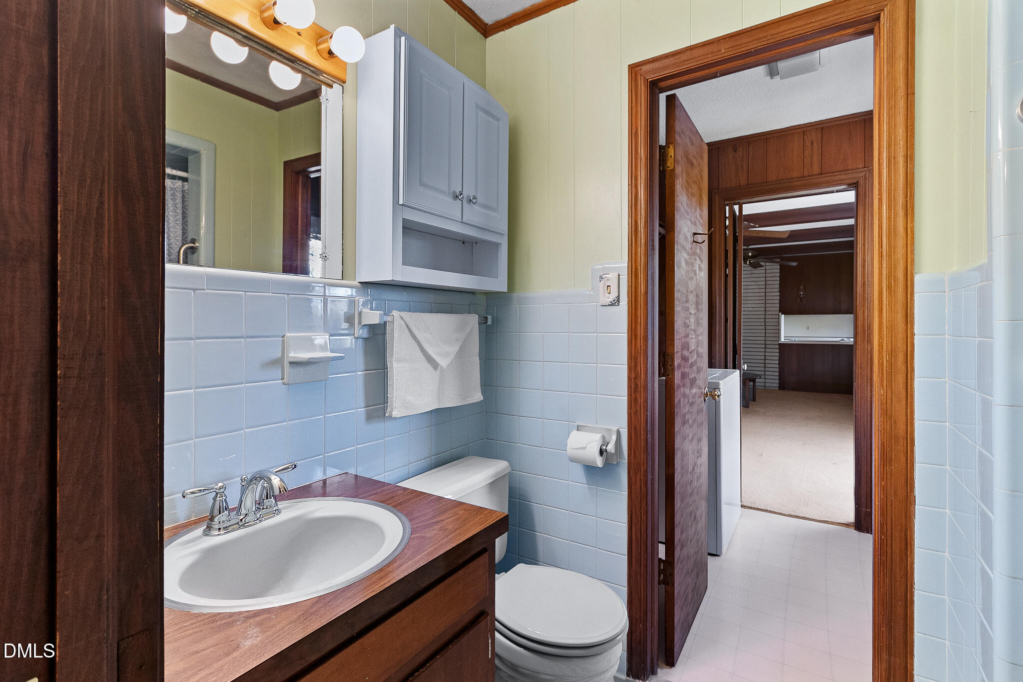 1704 Marshburn Road Wendell, NC 27591 - Photo 16 of 27 a bathroom with a sink a toilet and mirror