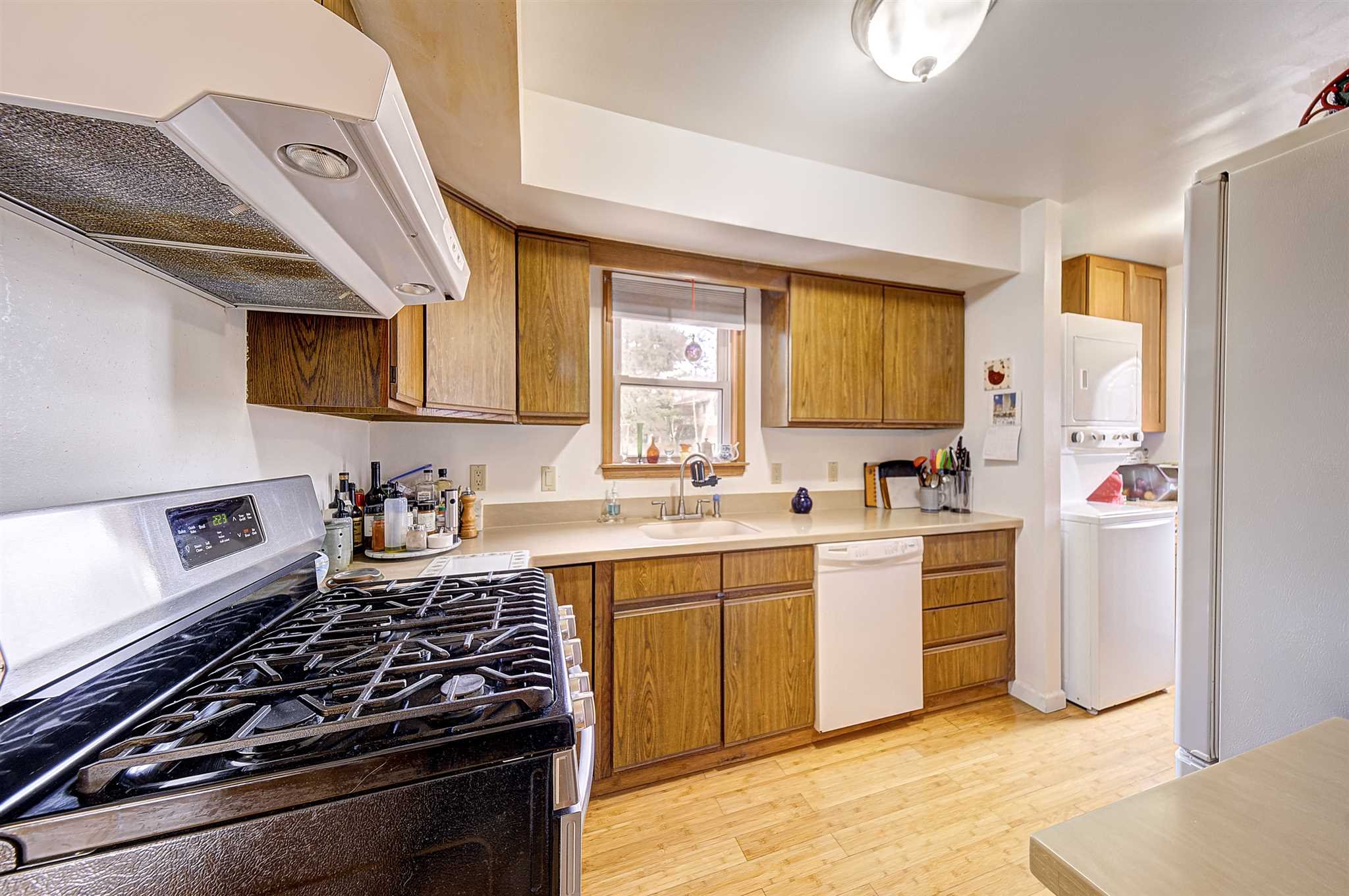 8 Sivers Place Beacon, NY 12508 - Photo 11 of 31 a kitchen with stainless steel appliances granite countertop a stove and a sink
