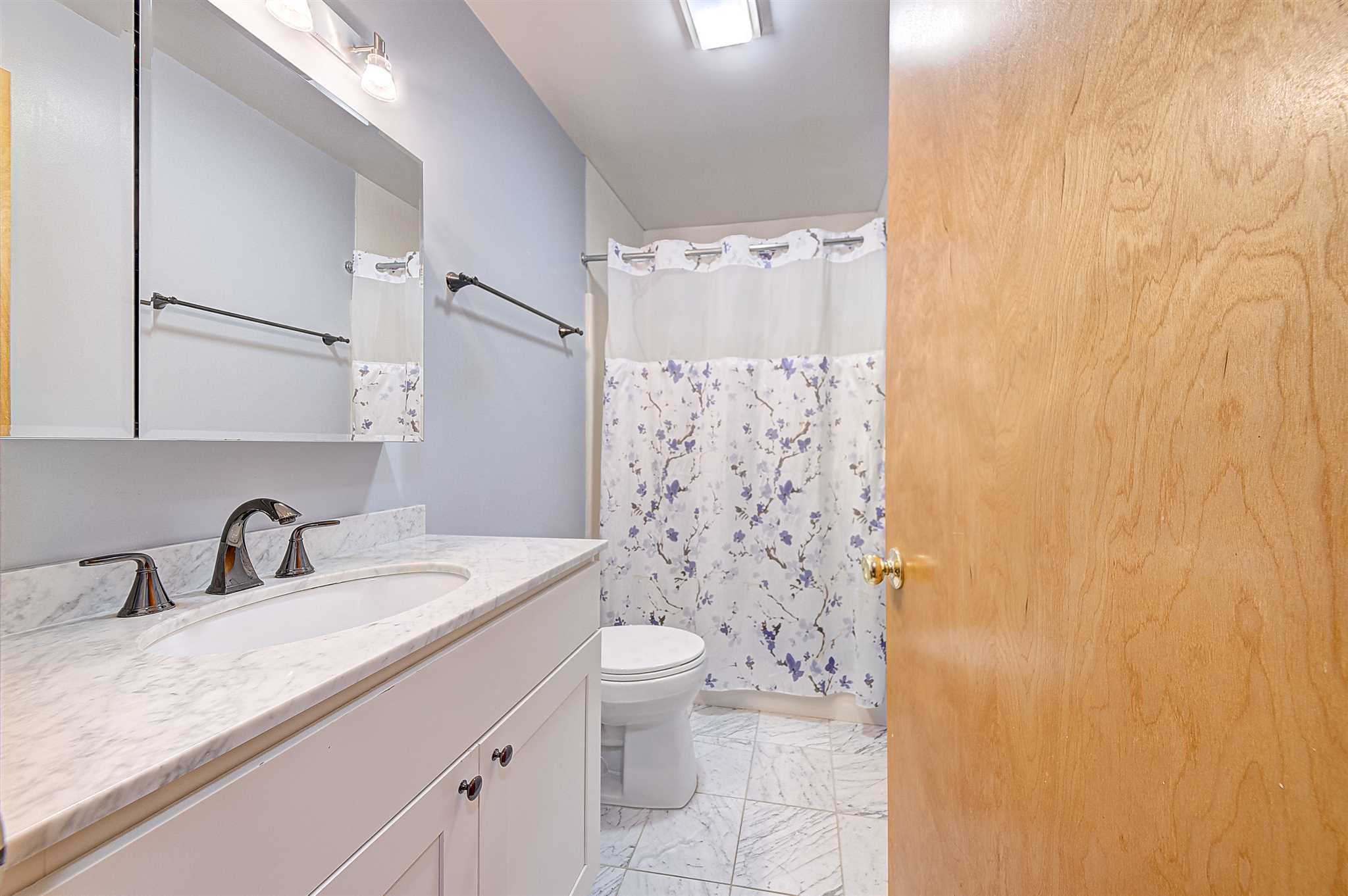8 Sivers Place Beacon, NY 12508 - Photo 15 of 31 a bathroom with a granite countertop sink toilet and shower