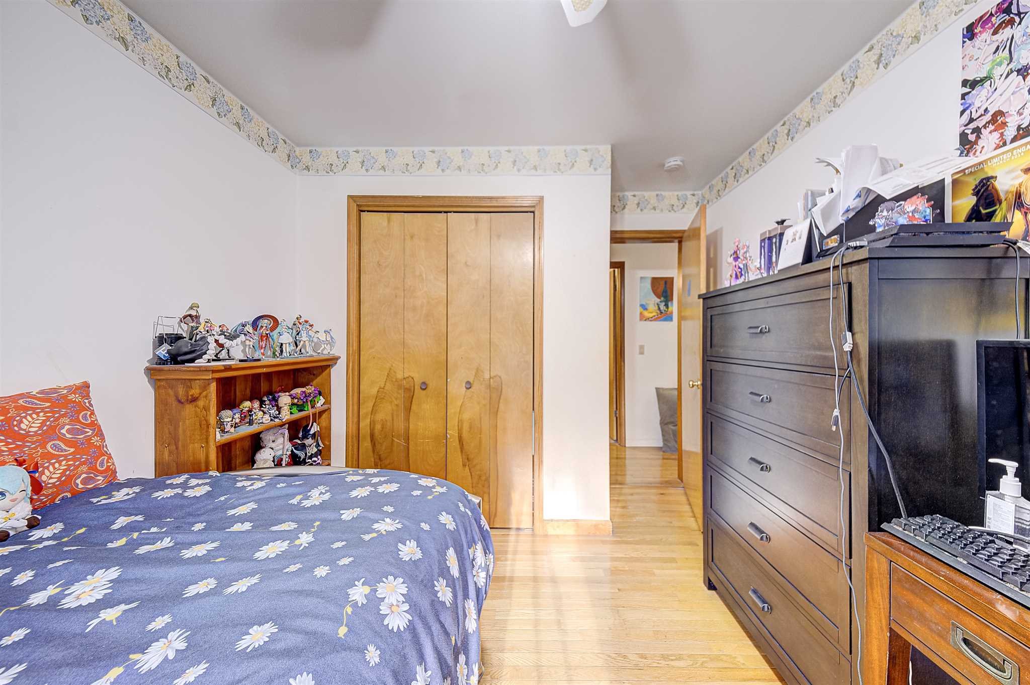 8 Sivers Place Beacon, NY 12508 - Photo 17 of 31 a bedroom with a bed and a dresser in it