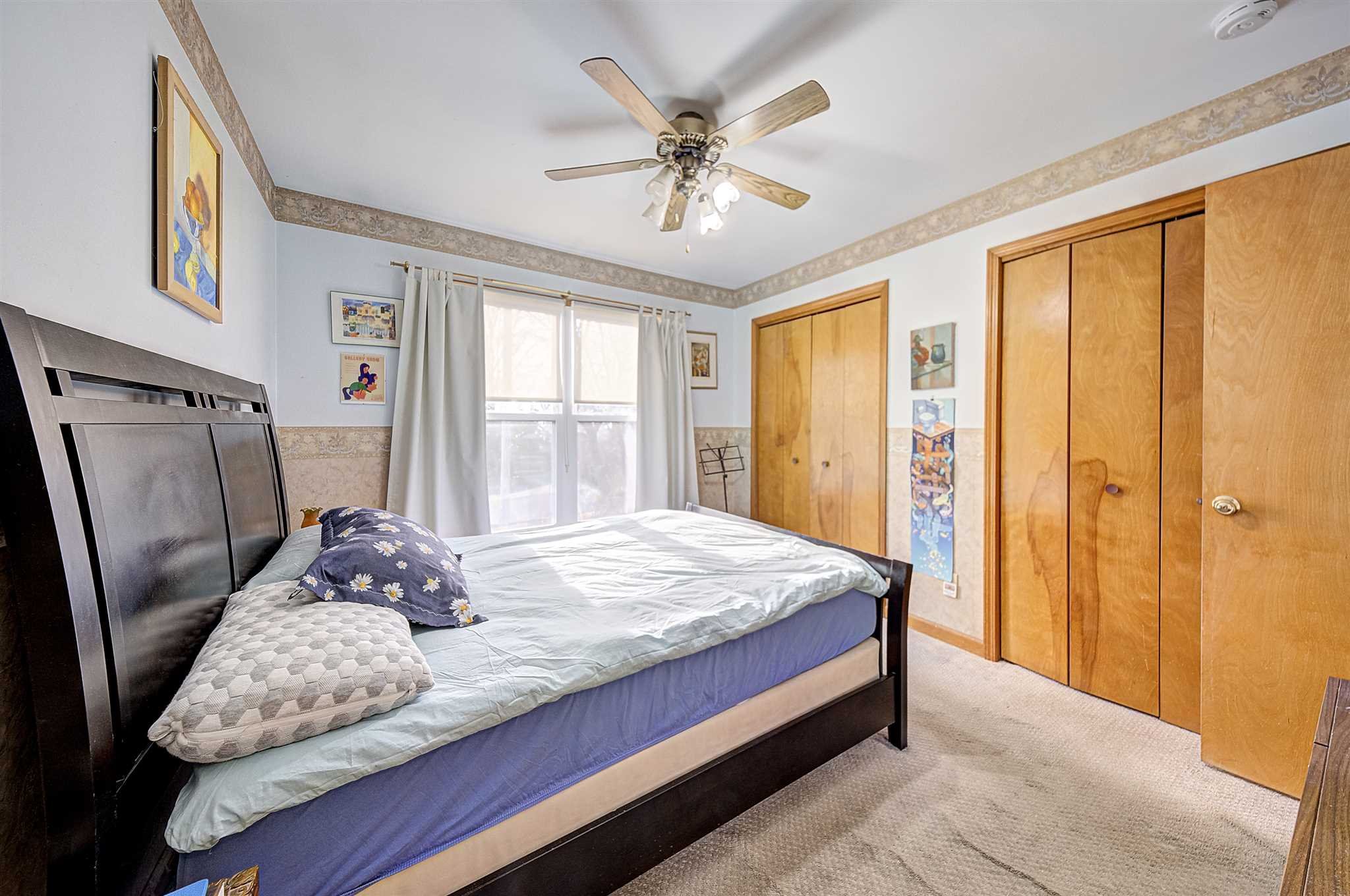 8 Sivers Place Beacon, NY 12508 - Photo 20 of 31 a bedroom with a bed and a large window