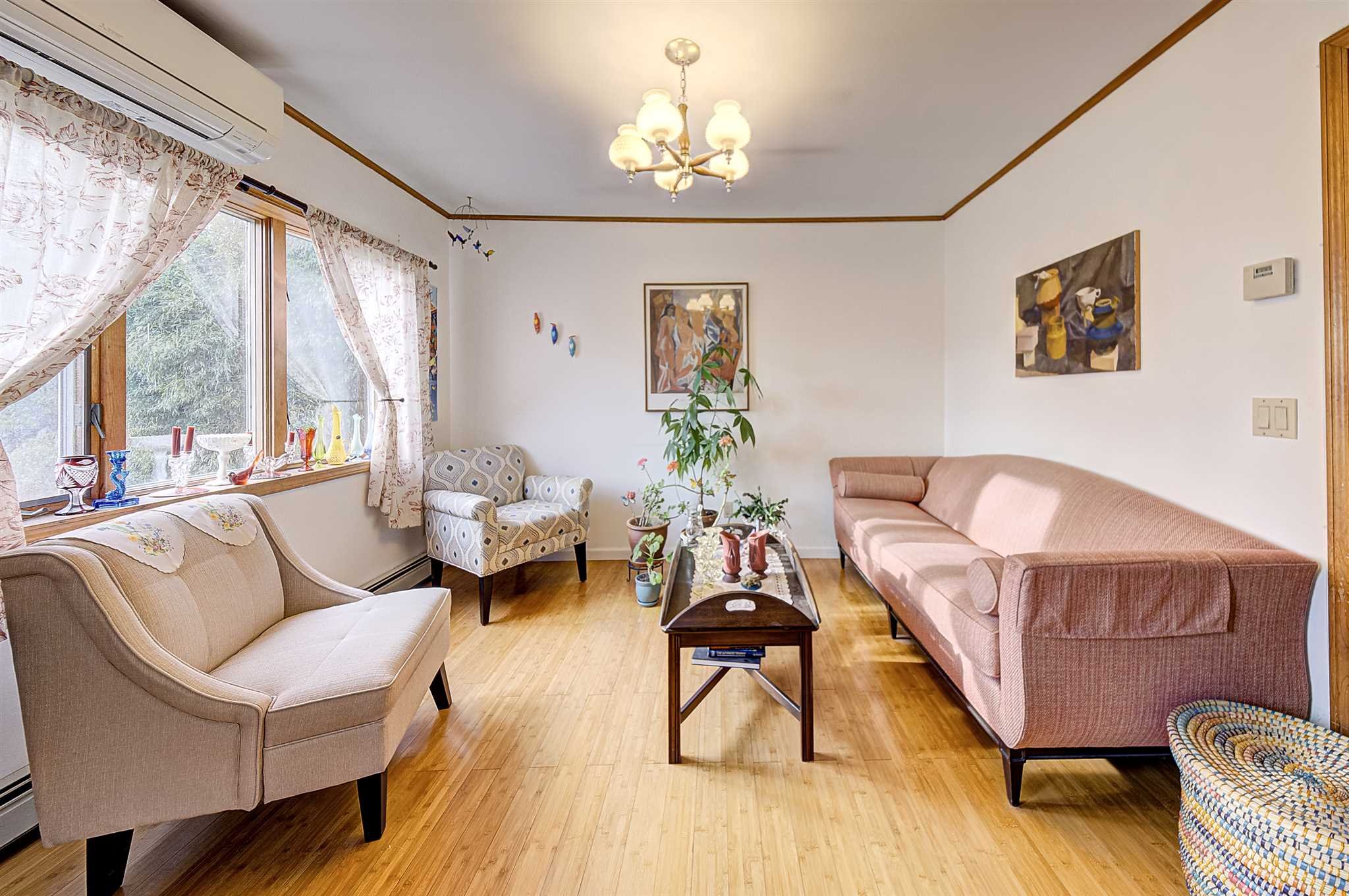 8 Sivers Place Beacon, NY 12508 - Photo 3 of 31 a living room with furniture and a large window