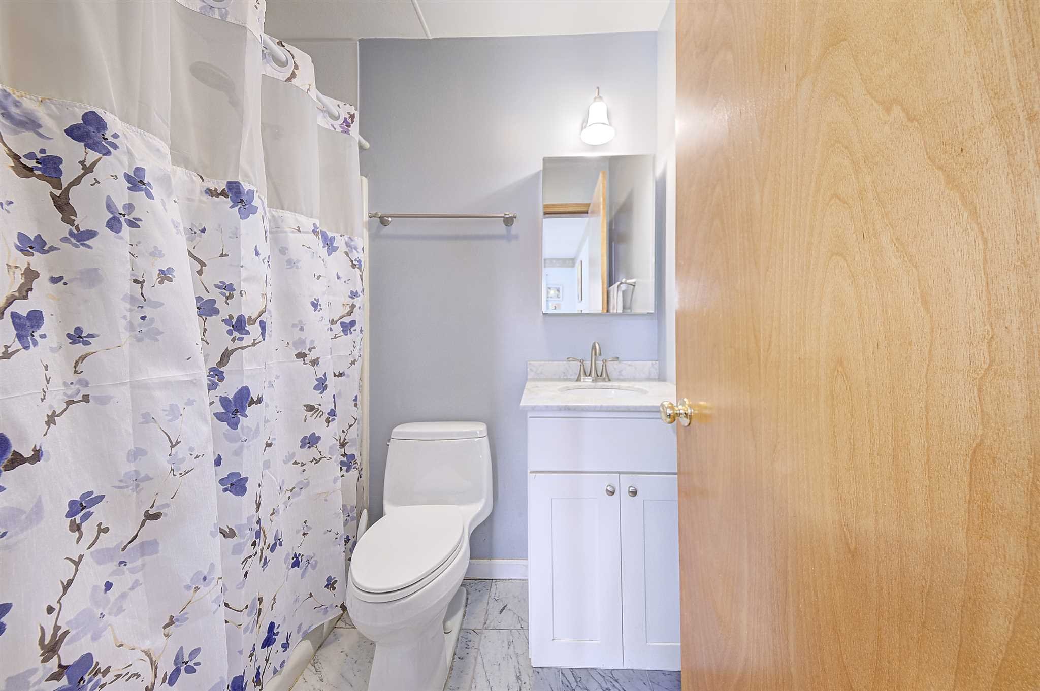 8 Sivers Place Beacon, NY 12508 - Photo 21 of 31 a bathroom with a toilet sink and a mirror