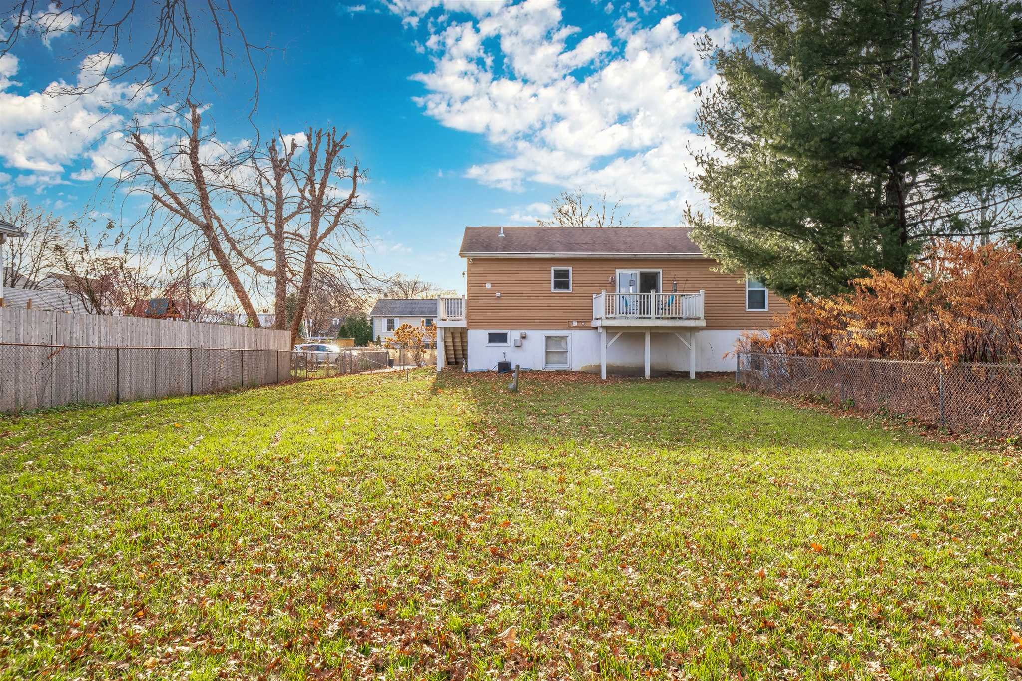 8 Sivers Place Beacon, NY 12508 - Photo 27 of 31 a view of a house with a large tree and a yard