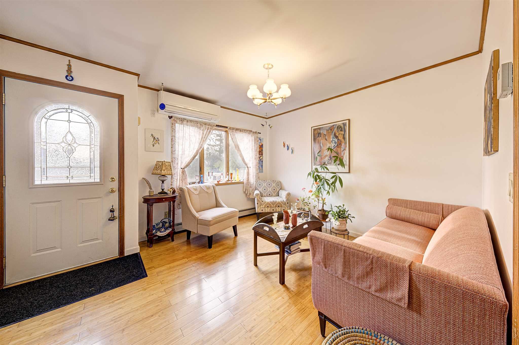 8 Sivers Place Beacon, NY 12508 - Photo 4 of 31 a living room with furniture a window and wooden floor