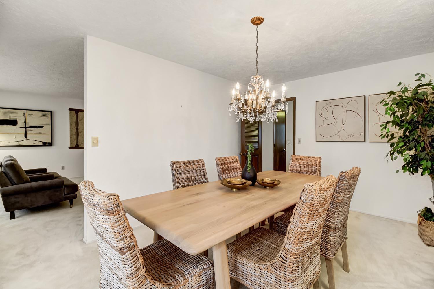2964 Marco Way Carmichael, CA 95608 - Photo 23 of 49 a view of a dining room with furniture and chandelier