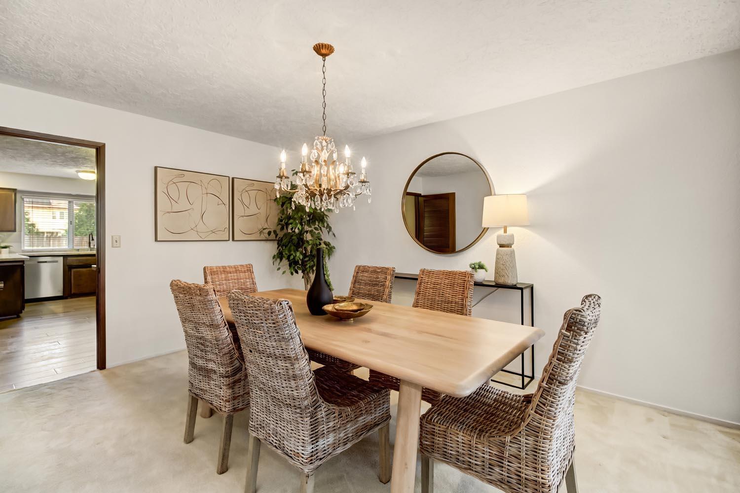 2964 Marco Way Carmichael, CA 95608 - Photo 24 of 49 a view of a dining room with furniture and chandelier