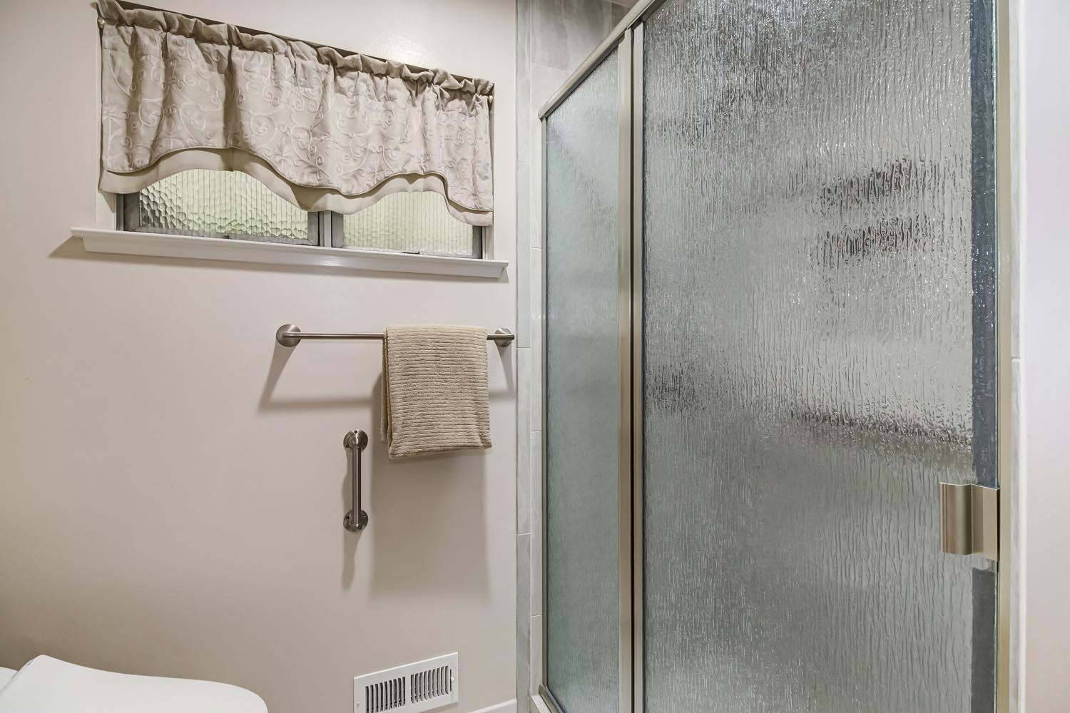 2964 Marco Way Carmichael, CA 95608 - Photo 29 of 49 a bathroom with a shower and toilet