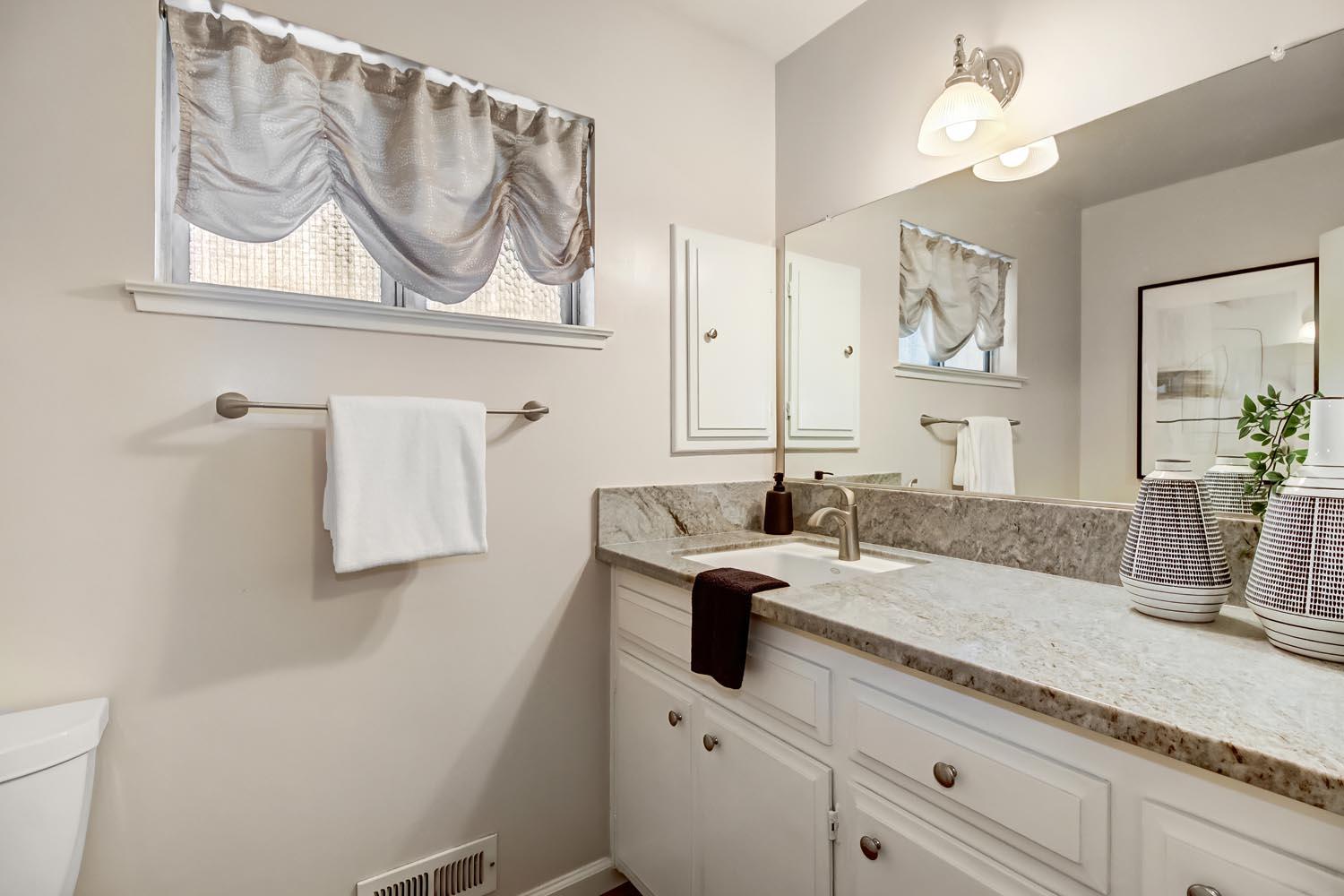 2964 Marco Way Carmichael, CA 95608 - Photo 33 of 49 a bathroom with a sink and a mirror