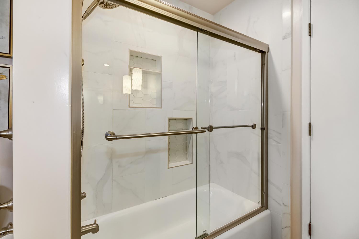 2964 Marco Way Carmichael, CA 95608 - Photo 37 of 49 a bathroom with a glass shower door