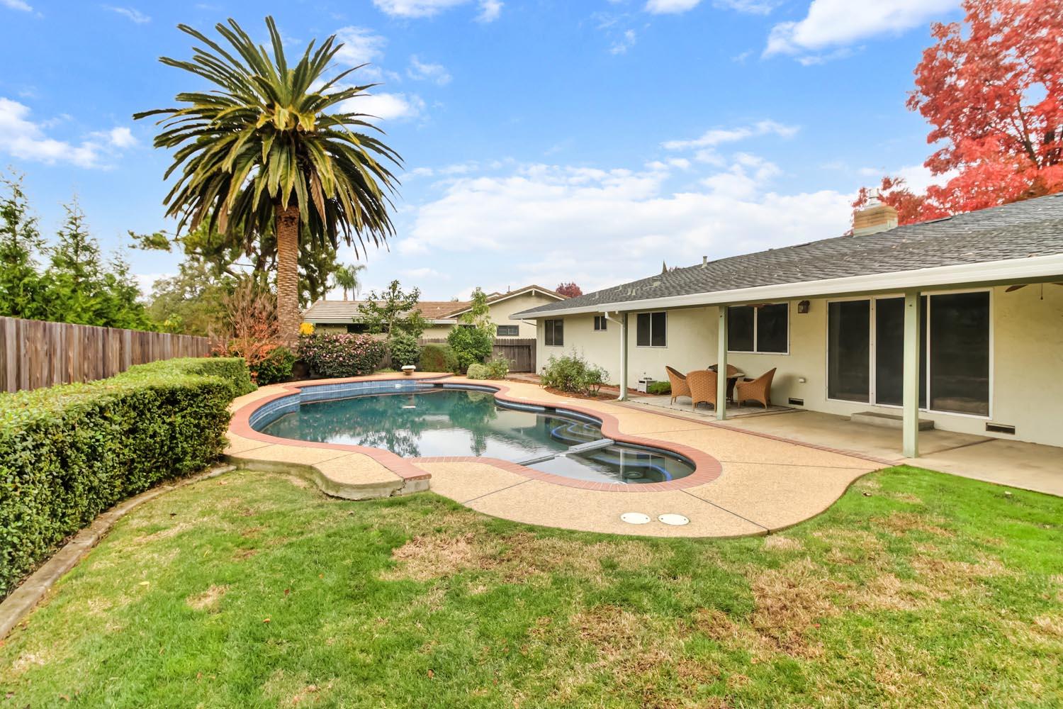 2964 Marco Way Carmichael, CA 95608 - Photo 49 of 49 a view of a house with swimming pool and sitting area