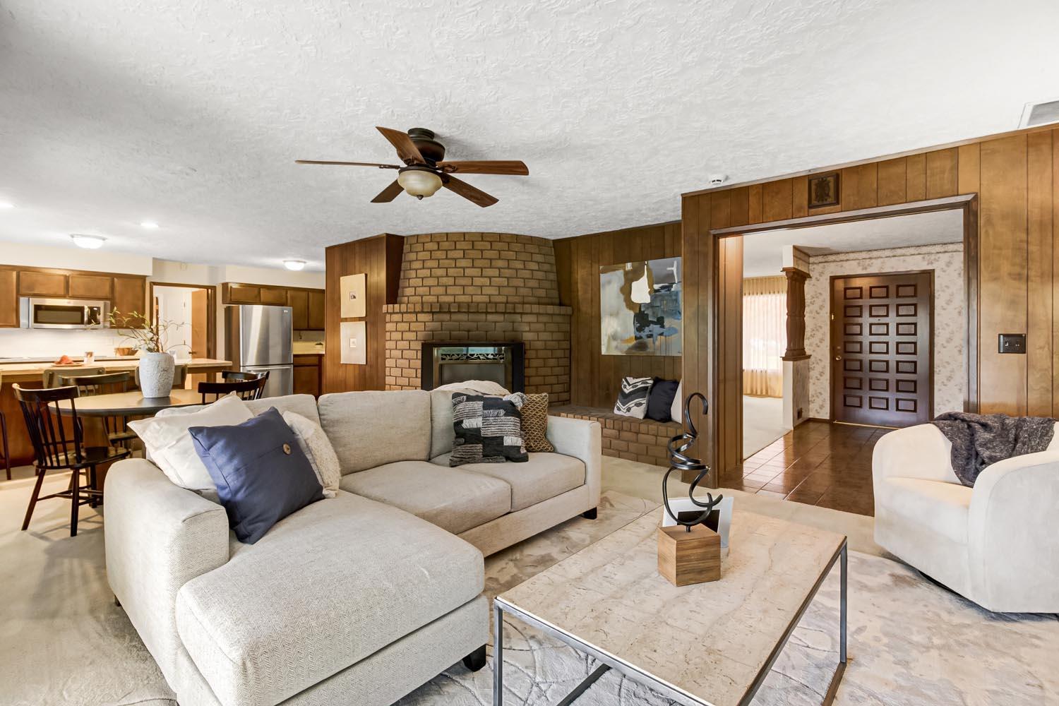 2964 Marco Way Carmichael, CA 95608 - Photo 9 of 49 a living room with furniture kitchen view and a fireplace