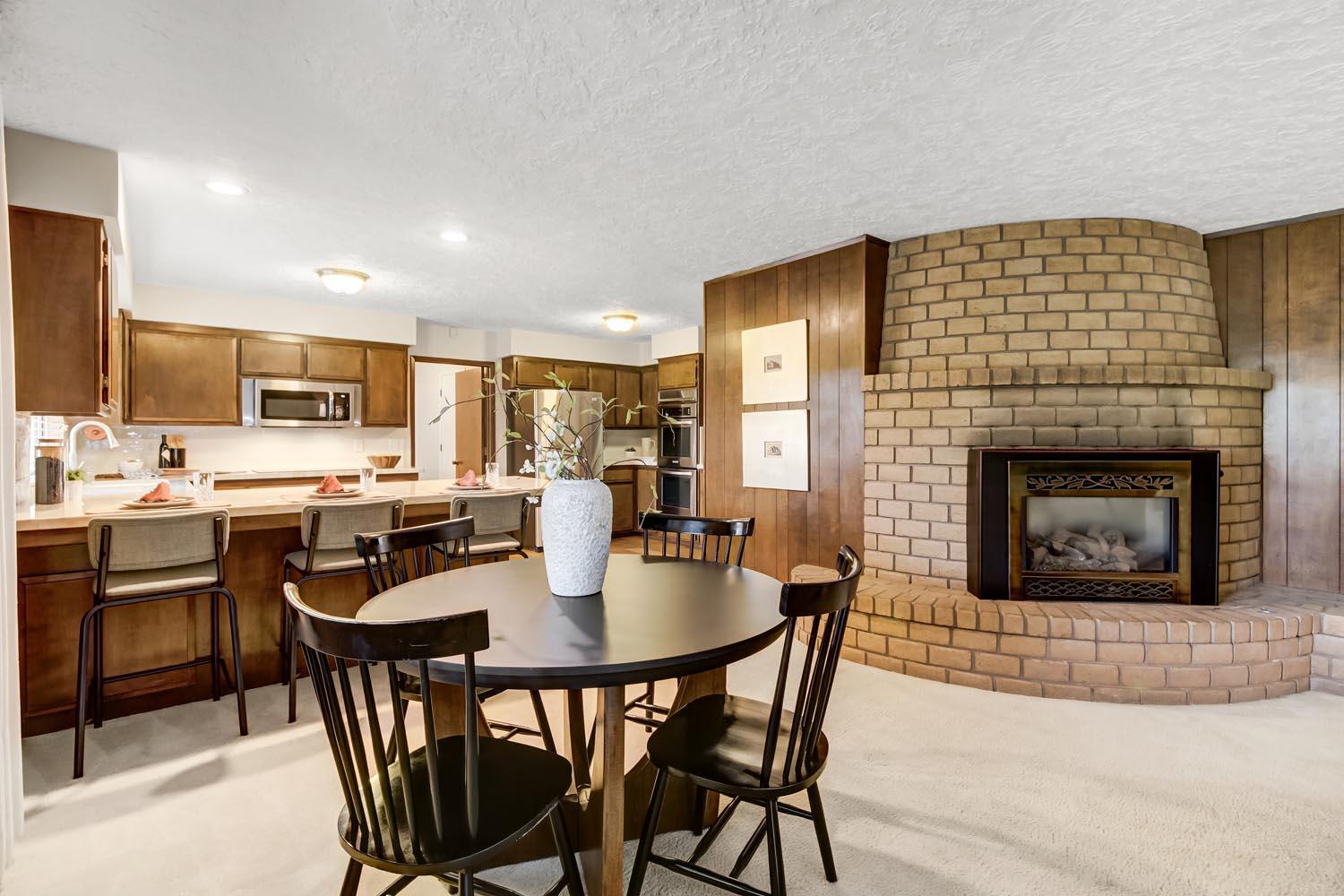 2964 Marco Way Carmichael, CA 95608 - Photo 10 of 49 a dining room with a table chairs and a kitchen view