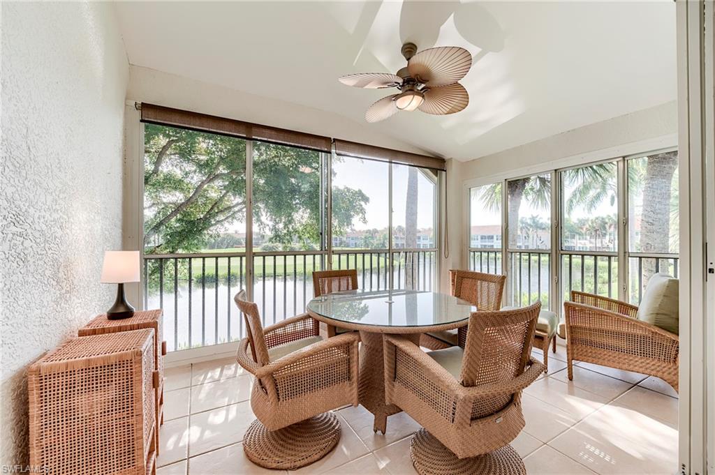 9241 Spring Run Boulevard, Unit 2202 Estero, FL 34135 - Photo 2 of 33 a living room with furniture and a large window