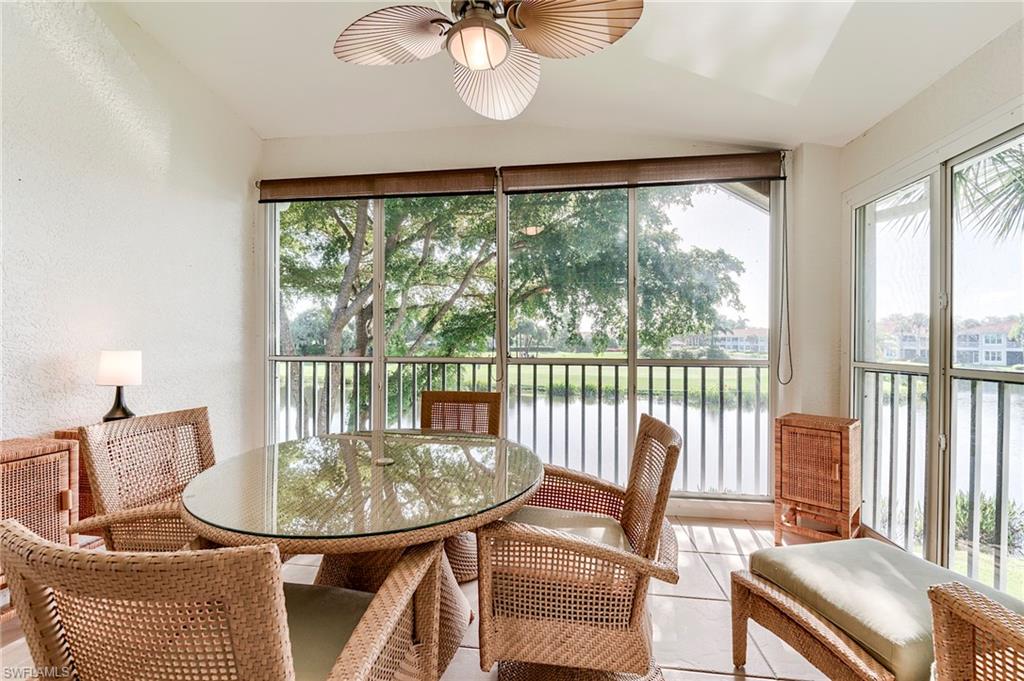 9241 Spring Run Boulevard, Unit 2202 Estero, FL 34135 - Photo 22 of 33 a view of a dining room with furniture window and outside view