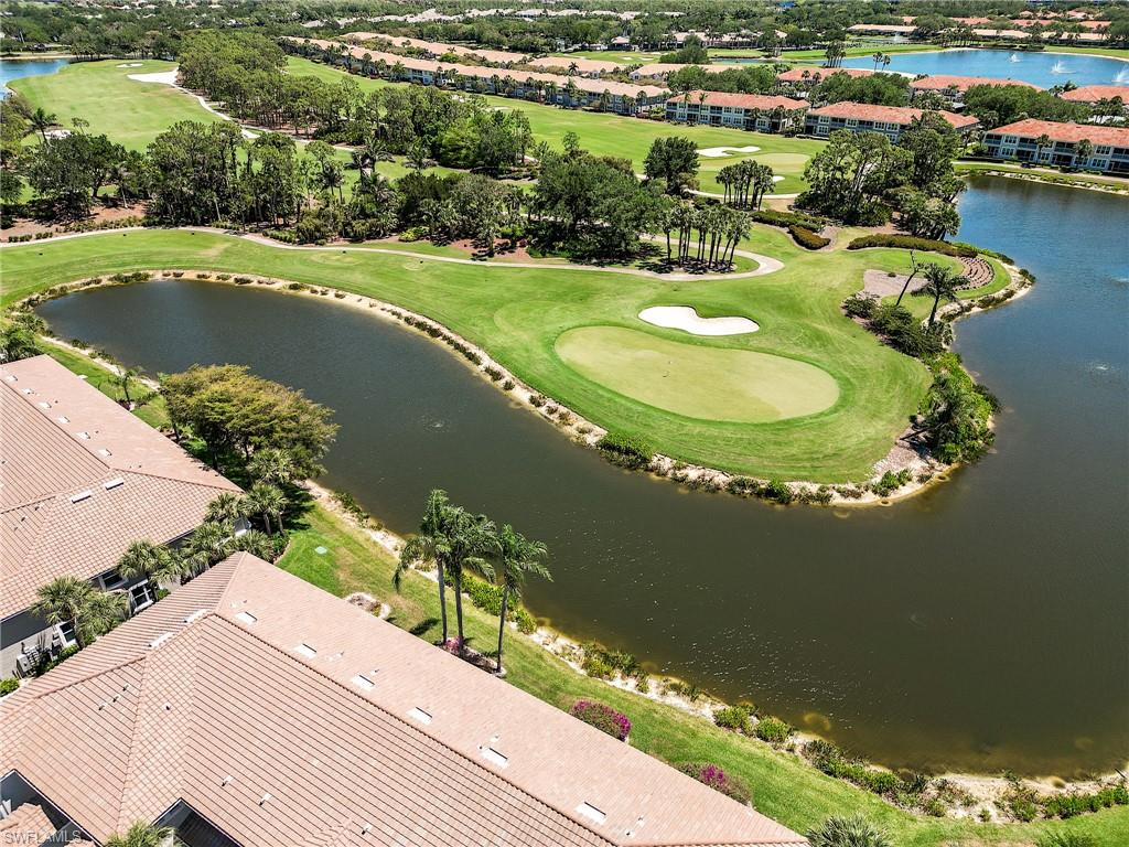 9241 Spring Run Boulevard, Unit 2202 Estero, FL 34135 - Photo 23 of 33 an aerial view of a house with a lake view
