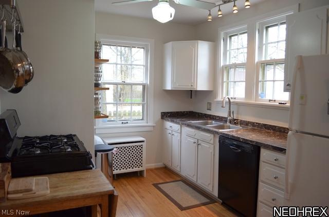3304 Chalfant Road Cleveland, OH 44120 - Photo 6 of 17 Updated kitchen with wood floors, appliances and great working space.