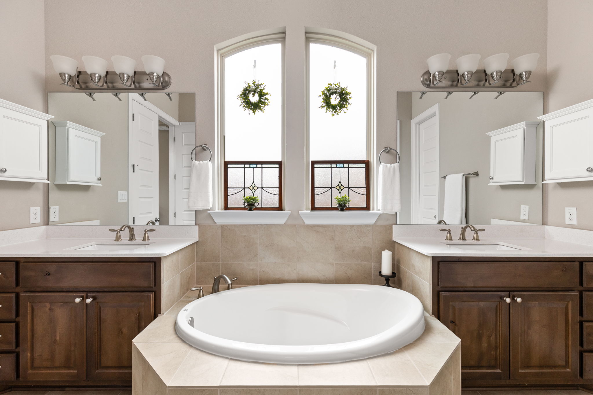 144 Cats Eye Cove Dripping Springs, TX 78620 - Photo 11 of 31 The primary bathroom's spacious design allows for comfortable morning and evening routines.