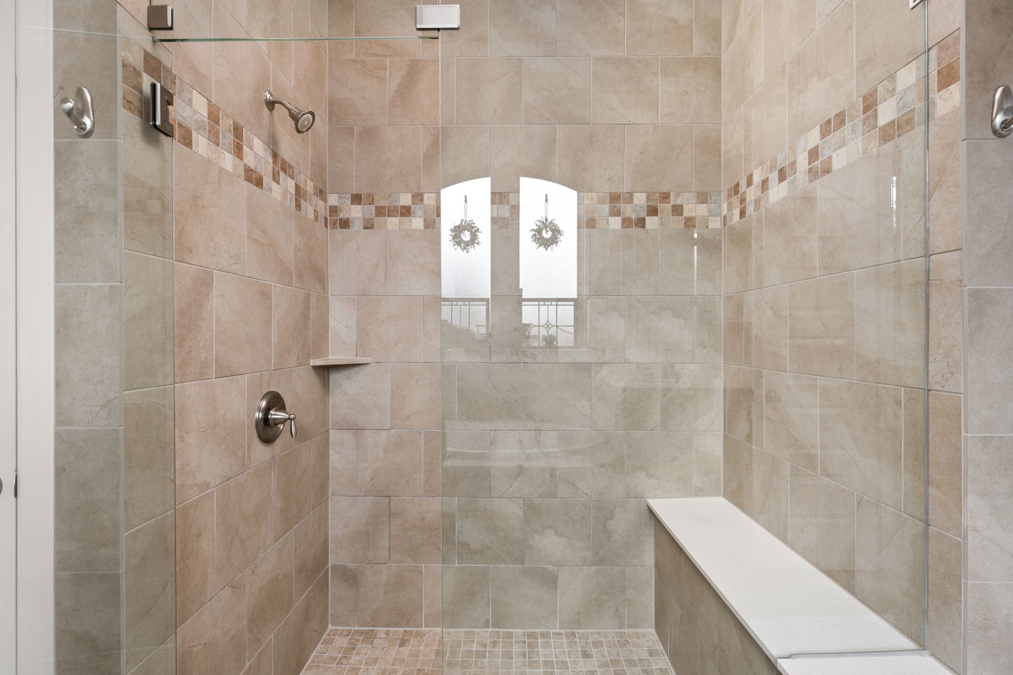 144 Cats Eye Cove Dripping Springs, TX 78620 - Photo 13 of 31 The separate walk-in shower offers a sleek and modern design.