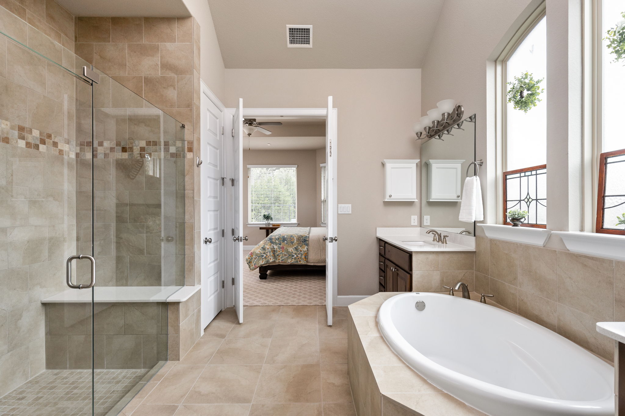 144 Cats Eye Cove Dripping Springs, TX 78620 - Photo 14 of 31 Neutral finishes create a timeless and calming aesthetic.