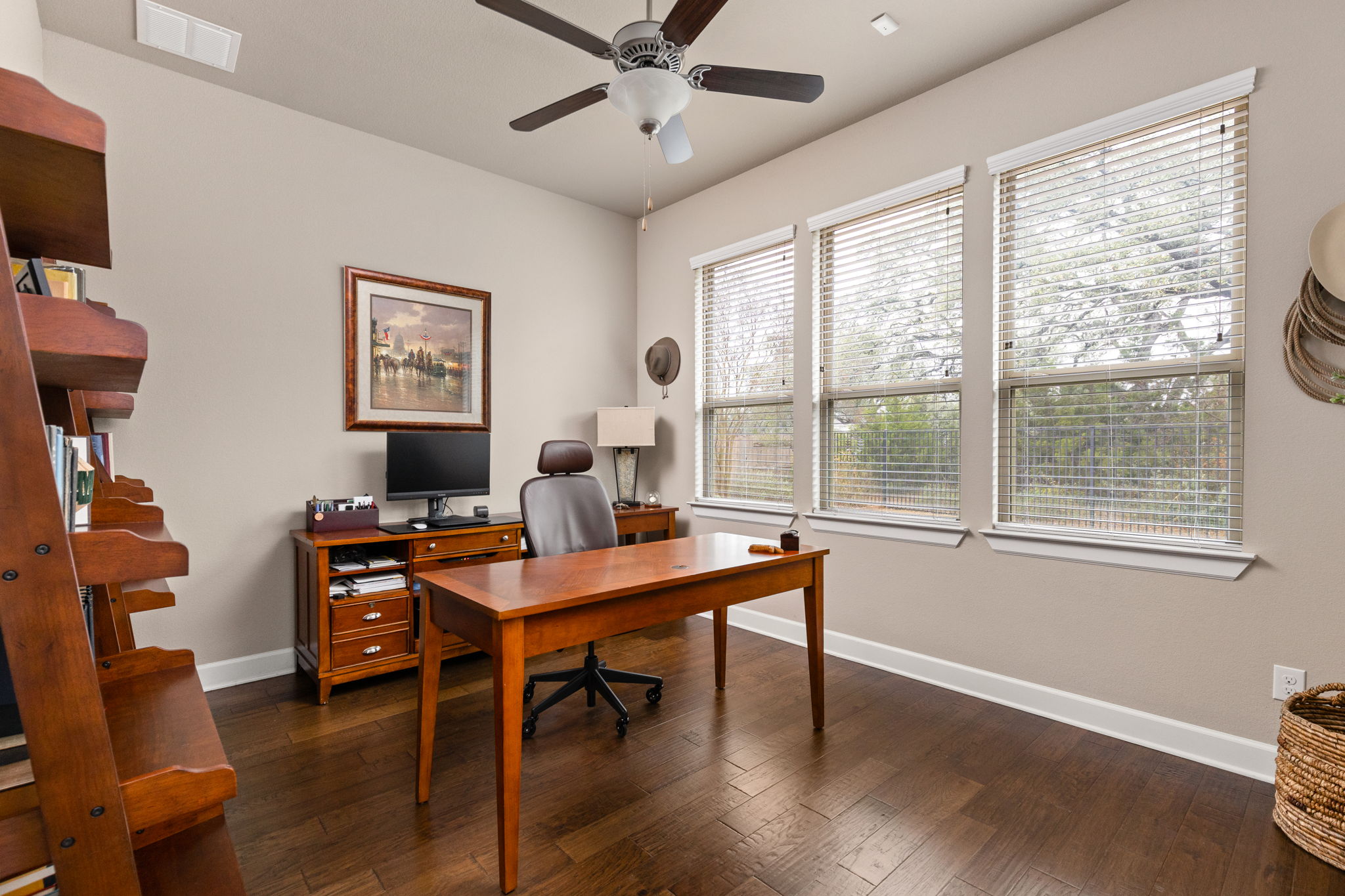 144 Cats Eye Cove Dripping Springs, TX 78620 - Photo 15 of 31 The dedicated home office with French doors provides privacy for focused work.