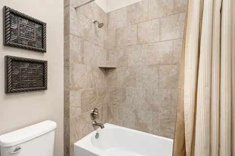 a bench sitting in the middle of a backyard