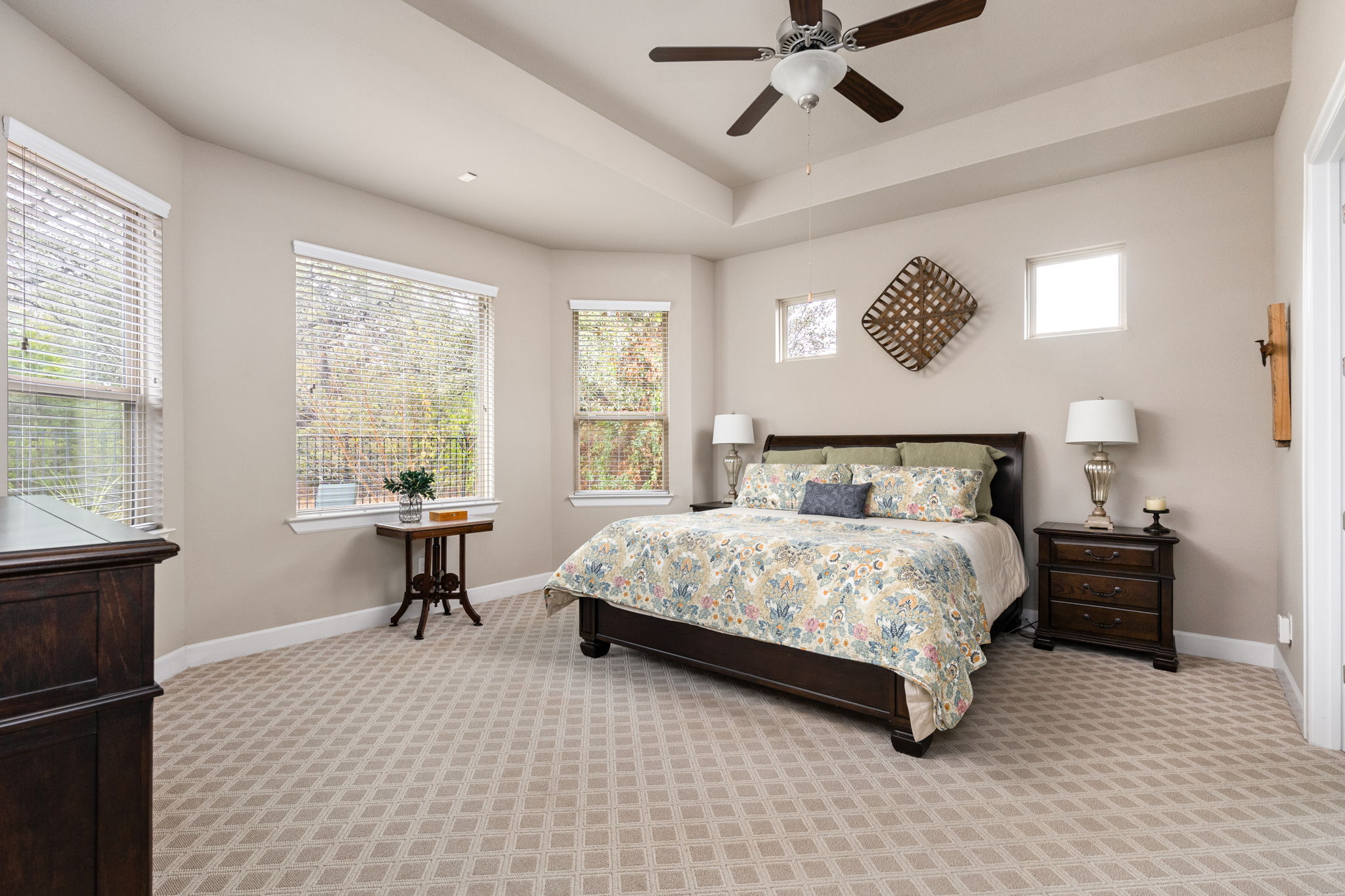 144 Cats Eye Cove Dripping Springs, TX 78620 - Photo 10 of 31 The spacious primary suite is designed as a private retreat.