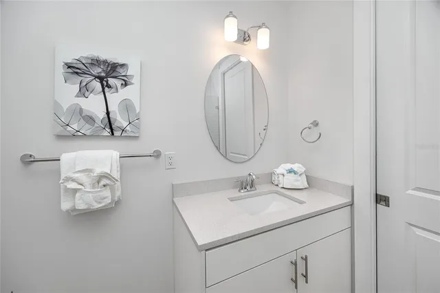 a view of building with river in front of it