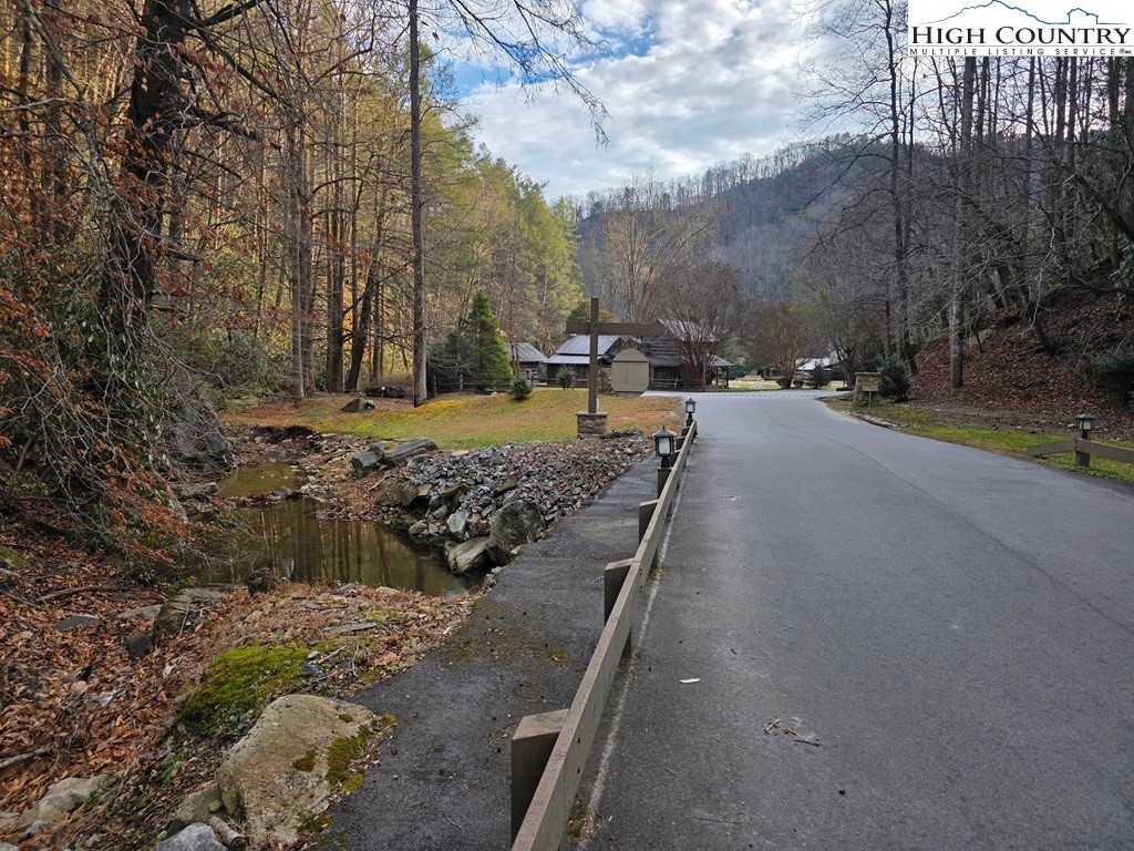 Lot 105 Holleridge Road Ferguson, NC 28624 - Photo 29 of 42 a view of a yard with large trees