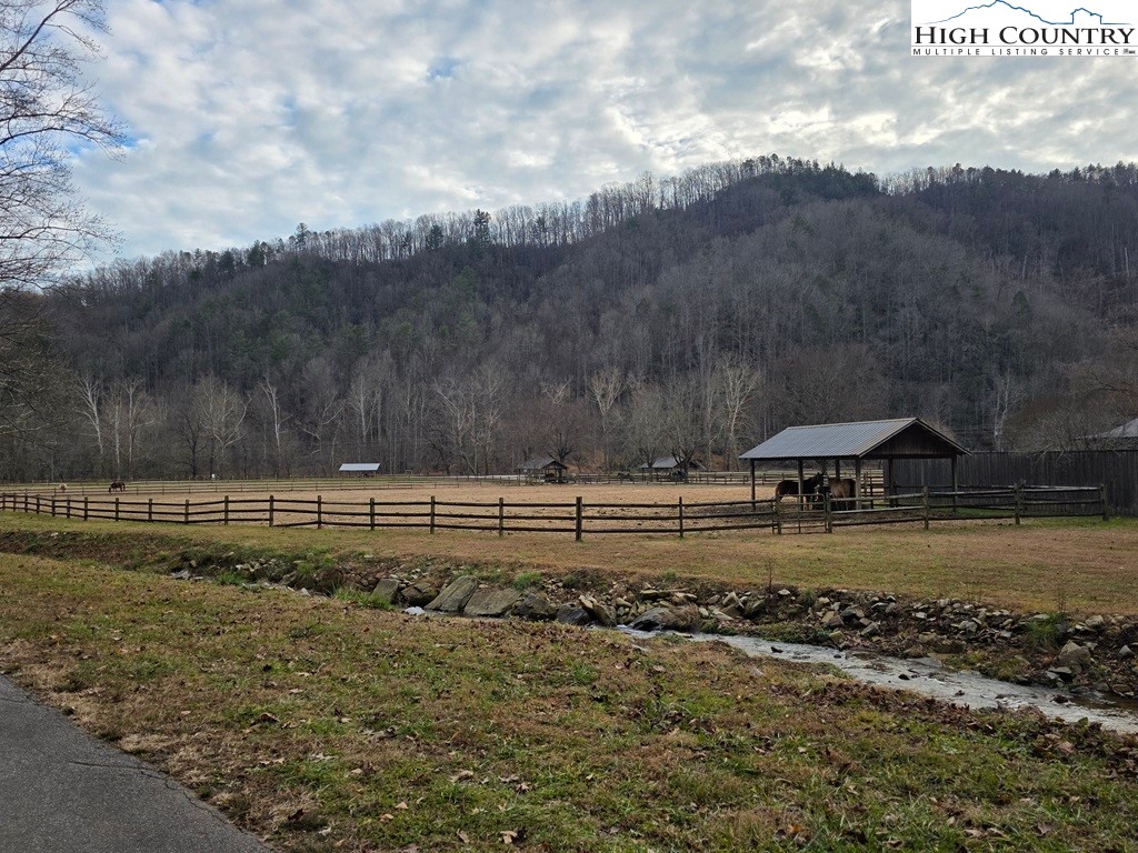 Lot 105 Holleridge Road Ferguson, NC 28624 - Photo 30 of 42 a view of a yard with wooden fence