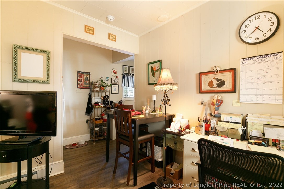 117 Ruth Street Fayetteville, NC 28305 - Photo 19 of 27 a view of a dining room with furniture and wooden floor