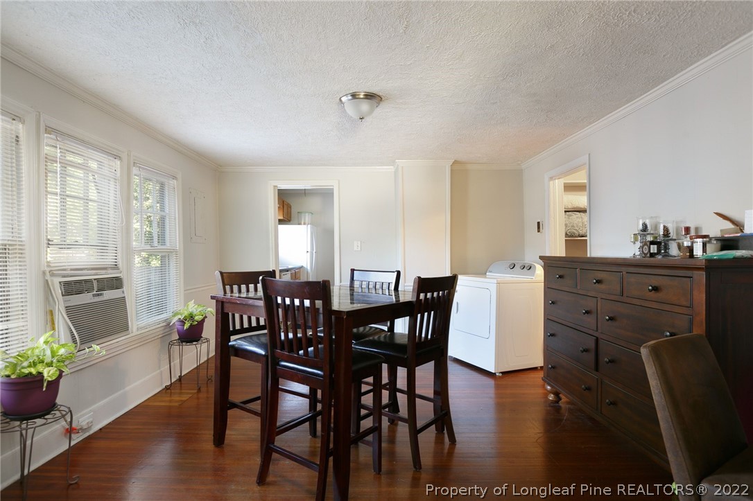 117 Ruth Street Fayetteville, NC 28305 - Photo 21 of 27 a view of a dining room with furniture and wooden floor