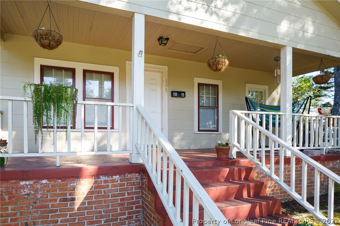 117 Ruth Street Fayetteville, NC 28305 - Photo 3 of 27 a view of a balcony with wooden floor