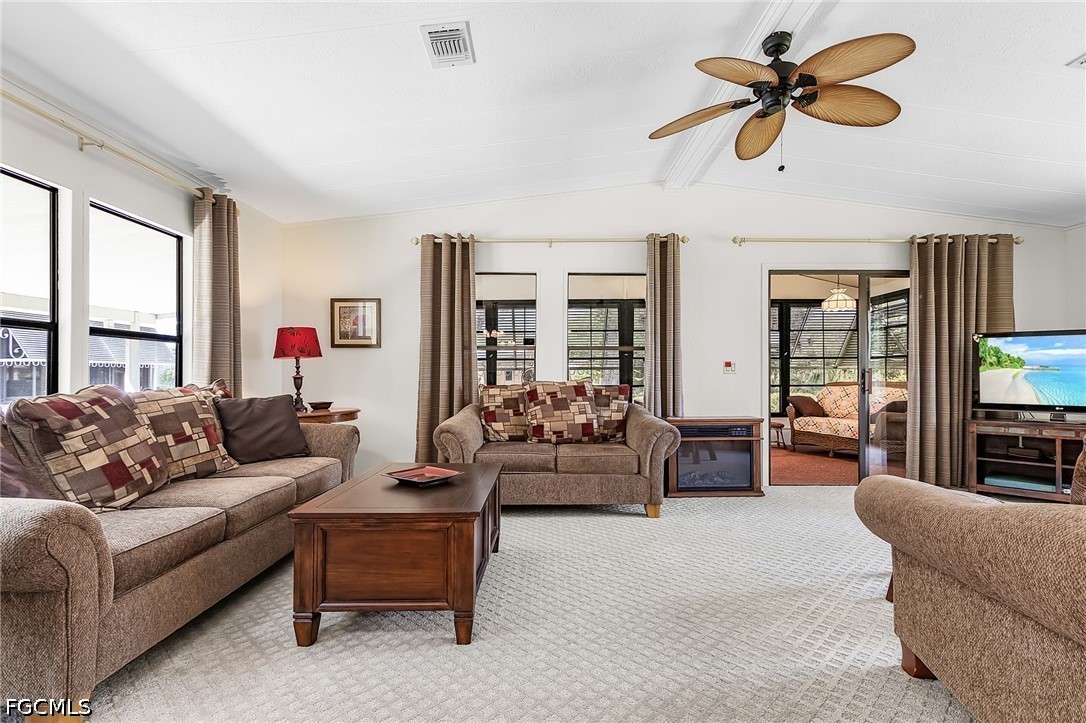 5 Erica Street Alva, FL 33920 - Photo 22 of 37 a living room with furniture ceiling fan and a window