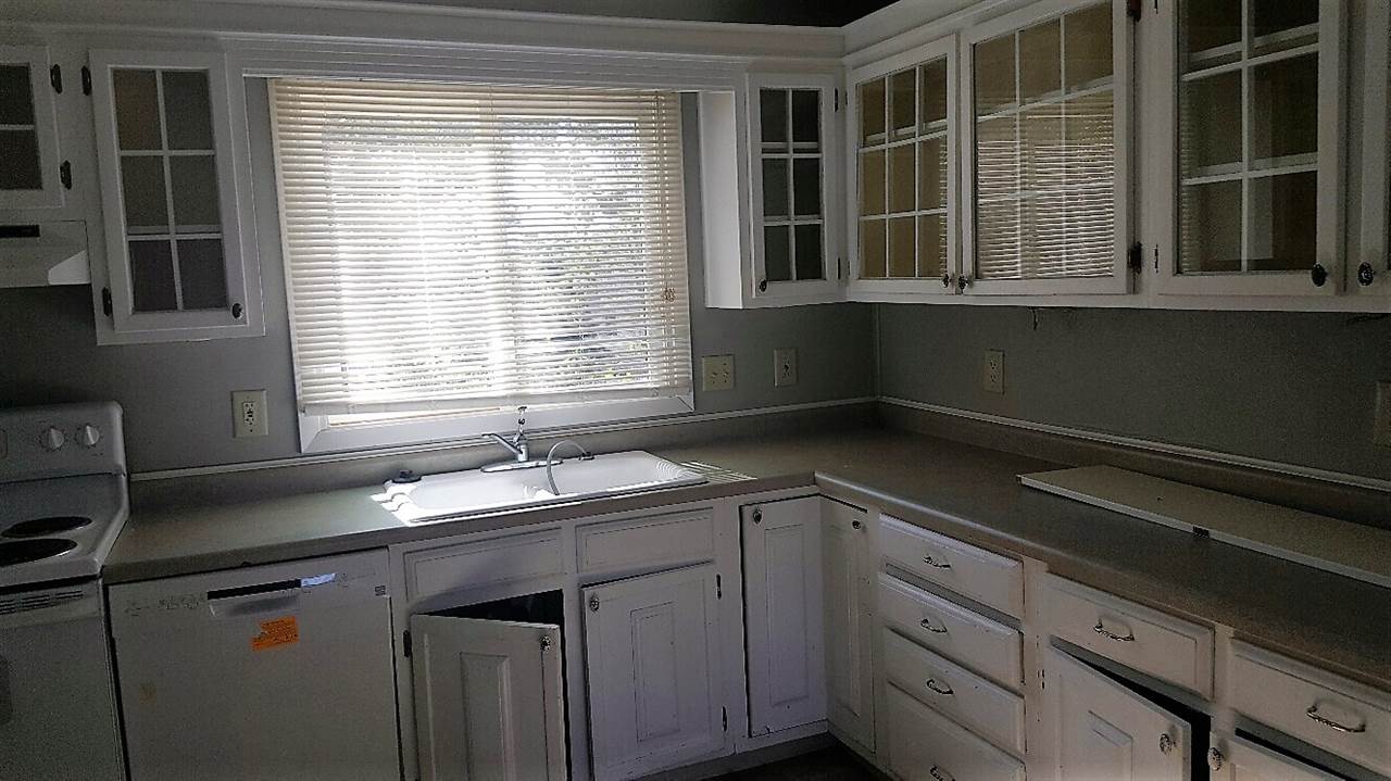 1044 Drexel Road Davis, IL 61019 - Photo 3 of 8 a kitchen with a sink and large window