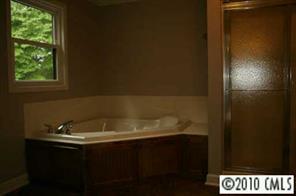1239 Micol Road Newton, NC 28658 - Photo 4 of 8 a bathroom with a sink and a window
