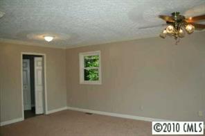 1239 Micol Road Newton, NC 28658 - Photo 5 of 8 en empty room with window