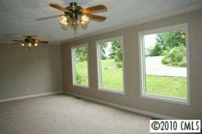 1239 Micol Road Newton, NC 28658 - Photo 6 of 8 a view of an empty room with a window